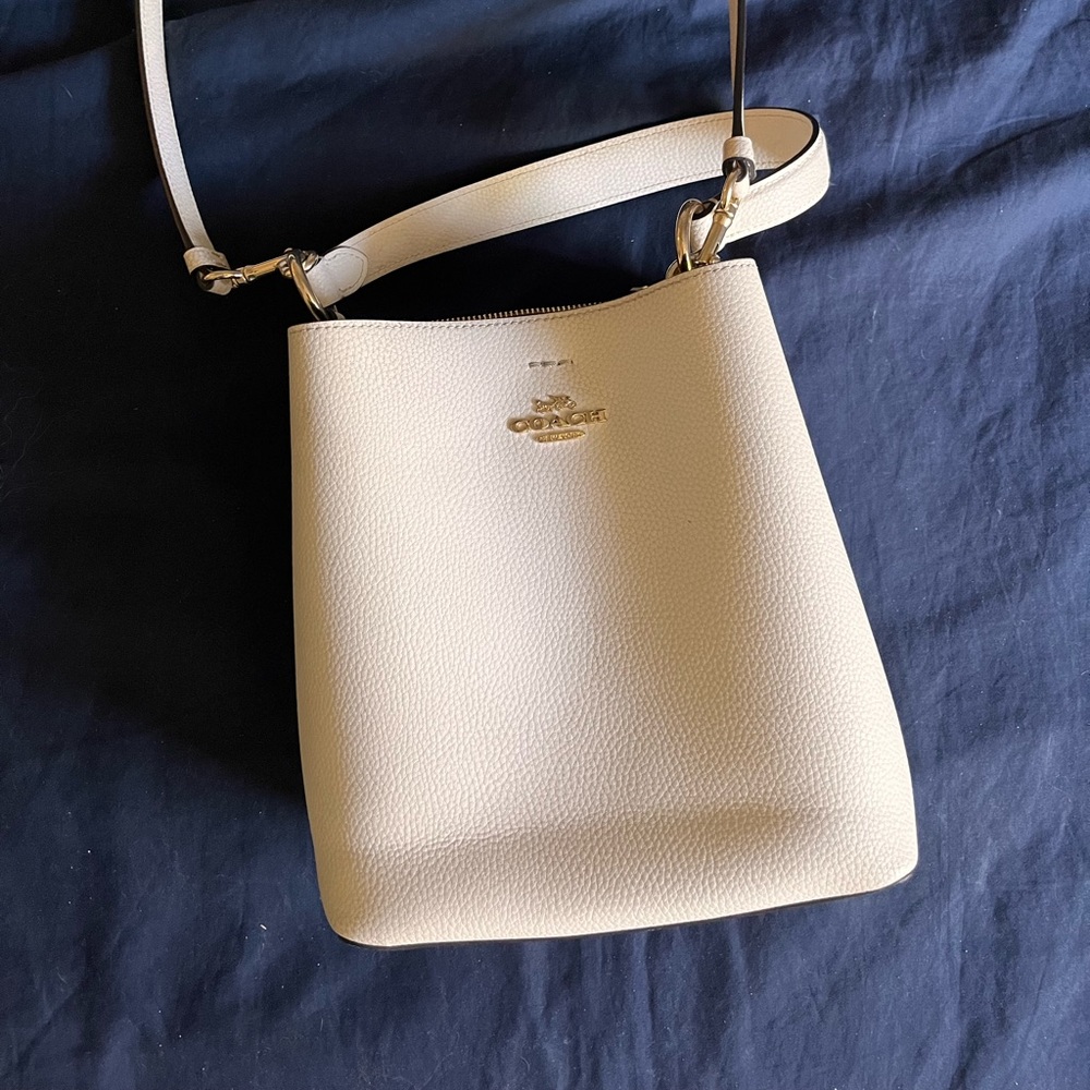 Cream Coach Bucket Bag w/ Gold Hardware